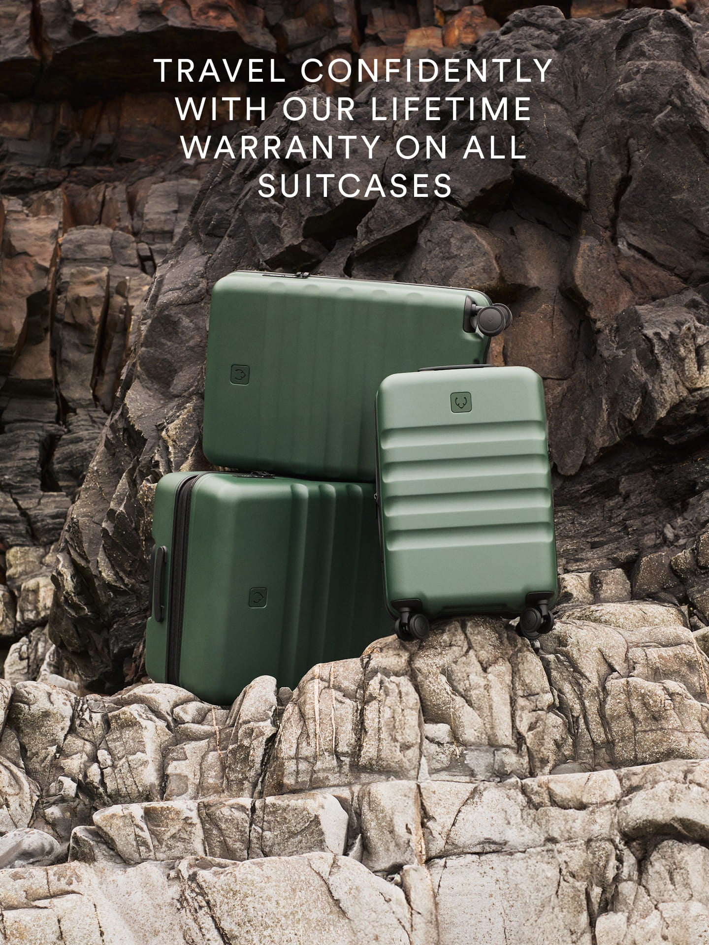 a group of luggage on a rocky surface