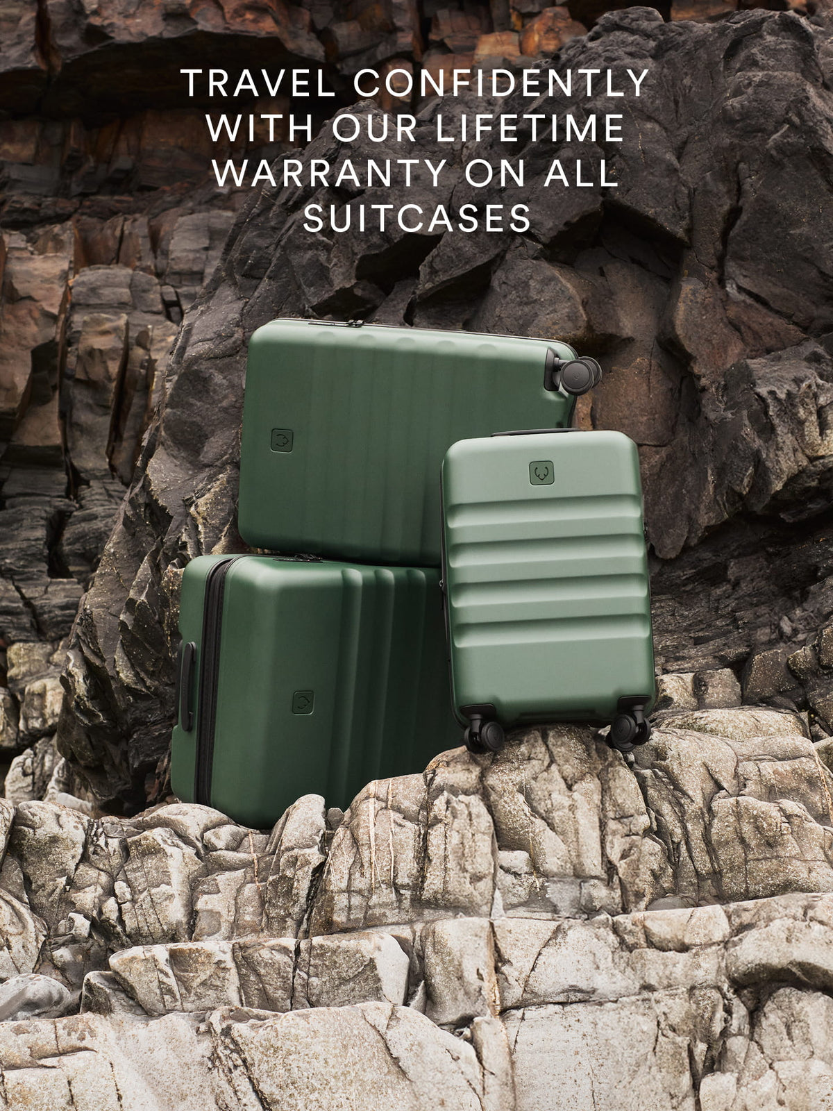 a group of luggage on a rocky surface