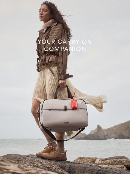 a woman walking with a bag