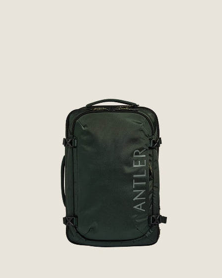 a green suitcase with a handle