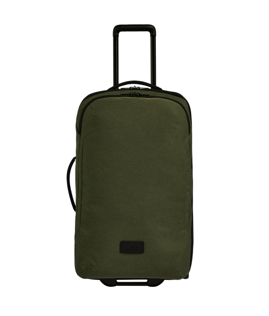 a green suitcase with black handles