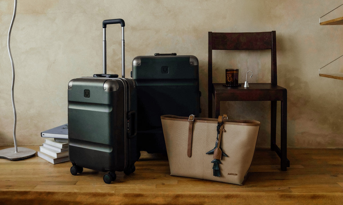 a group of luggage and a chair