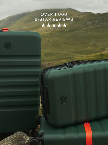 a group of luggage on top of each other