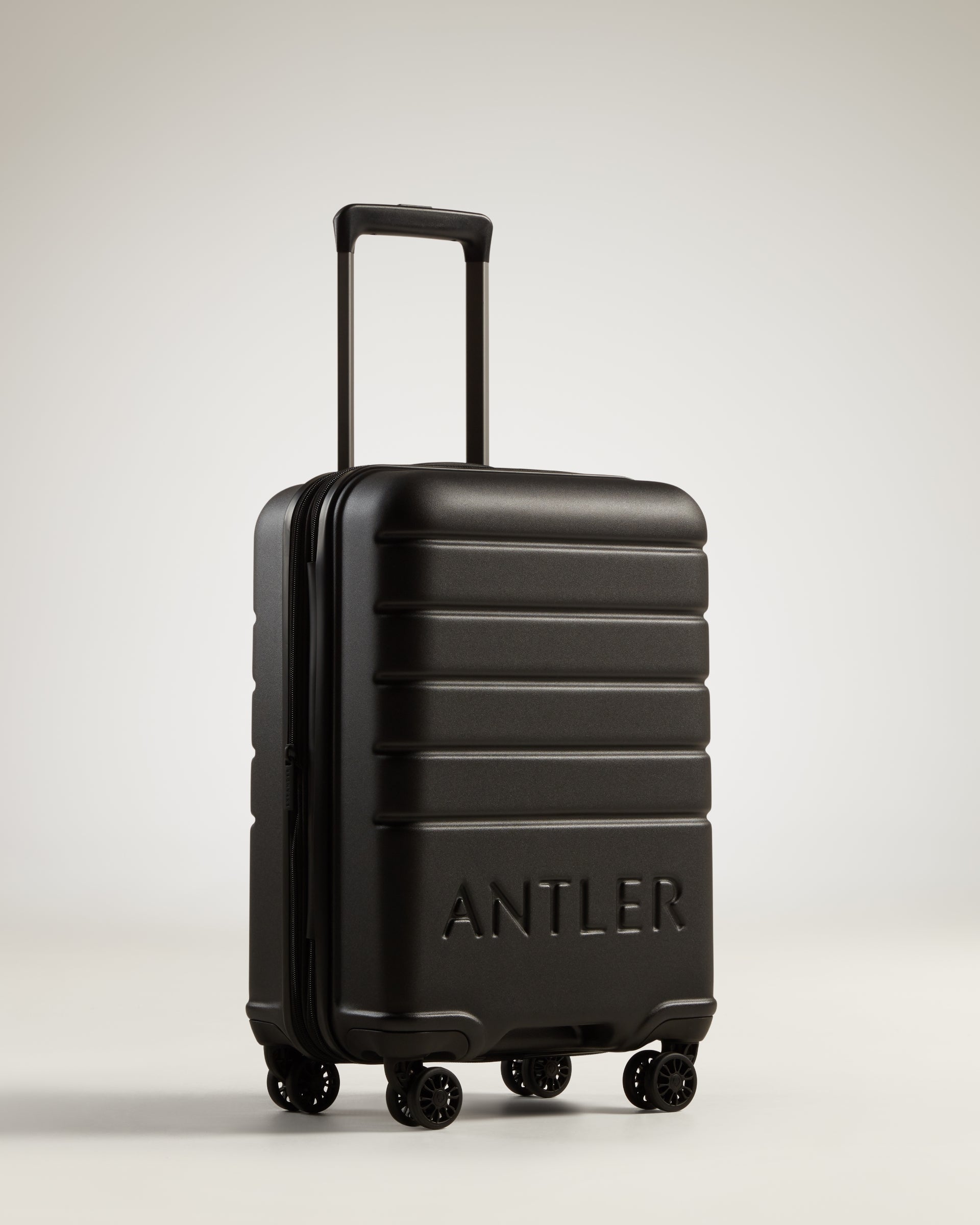 a black suitcase with wheels