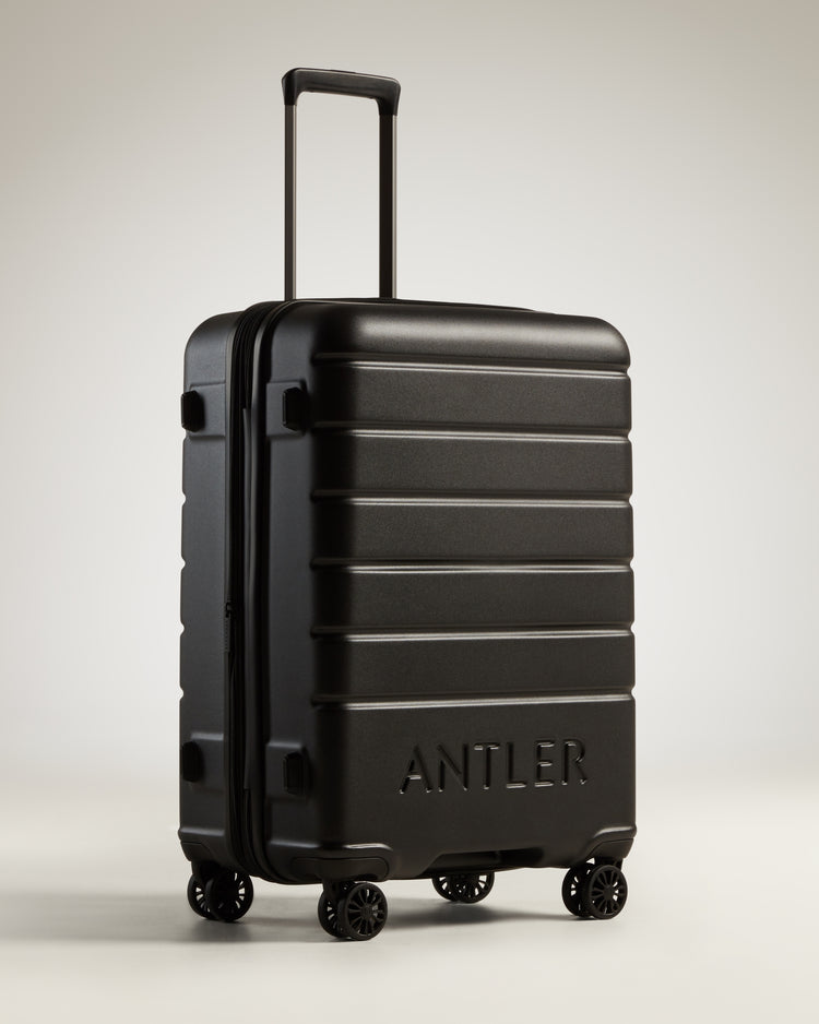 Medium Luggage in Black - Logo