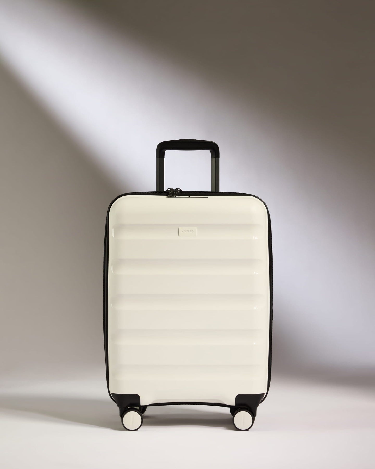 Antler Luggage -  Expandable Cabin Suitcase in White - Logo Stripe - Hard Suitcase - Expander Cabin Expandable Cabin Suitcase White - Logo Stripe | Lightweight Hard Shell Luggage