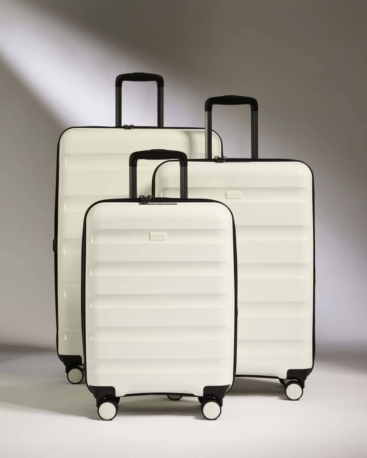 Antler Luggage -  Expandable Cabin Suitcase Set in White - Logo Stripe - Hard Suitcase - Expander Cabin Set Expander Cabin Suitcase Set of 3 Black - Logo Stripe | Lightweight Hard Shell Luggage