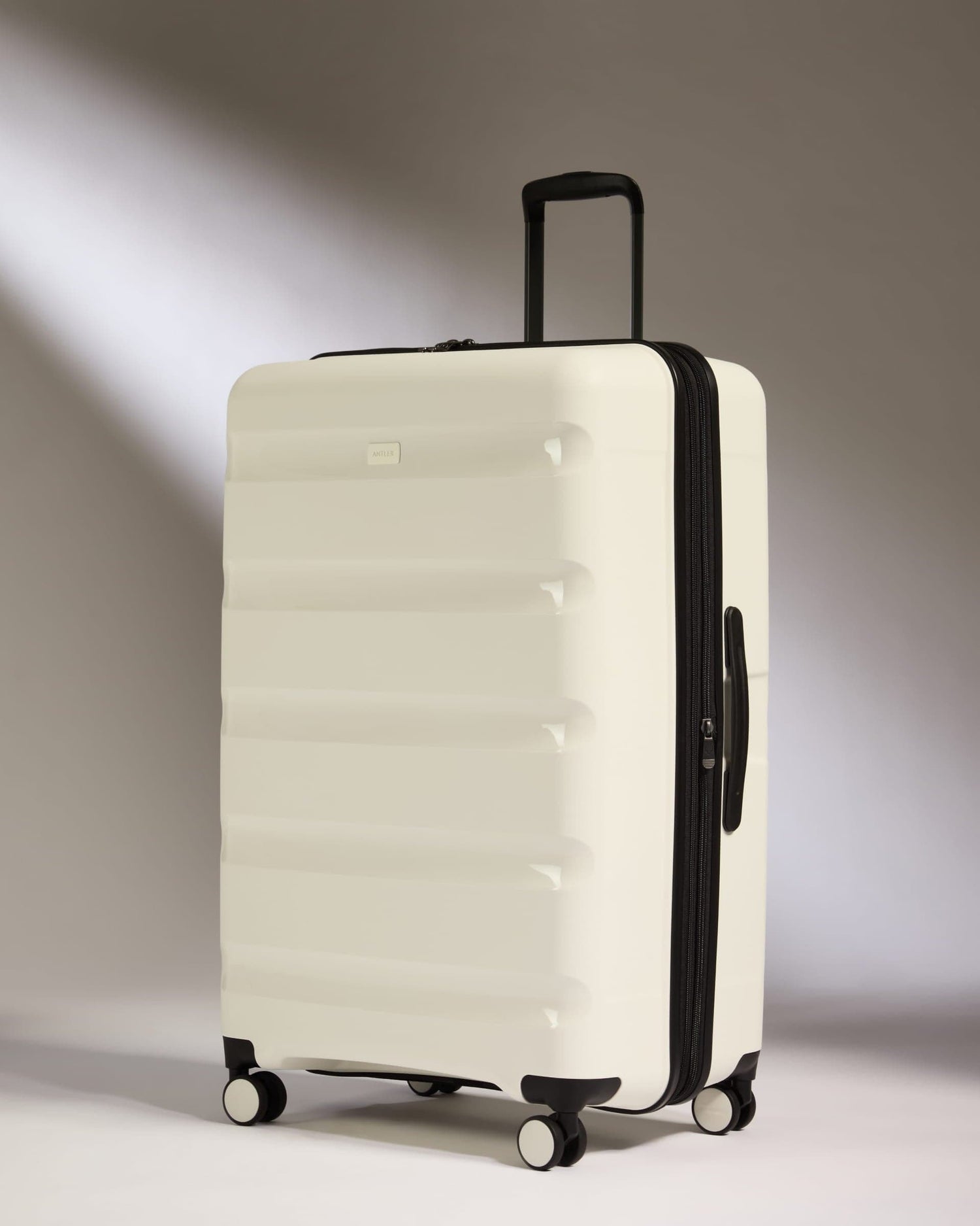 Antler Luggage -  Large Suitcase in White - Logo Stripe - Hard Suitcase - Large Large Suitcase White - Logo Stripe | Lightweight Hard Shell Luggage