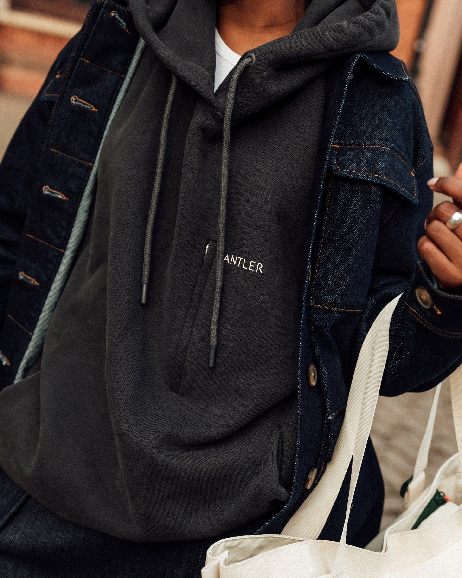 Travel Essential Hoodie in Charcoal Black - Main Image